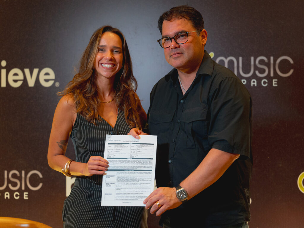 Rafaela de Carvalho, Head de Artist Services da Believe e Alessandro Lanuce, fundador da OK! Music